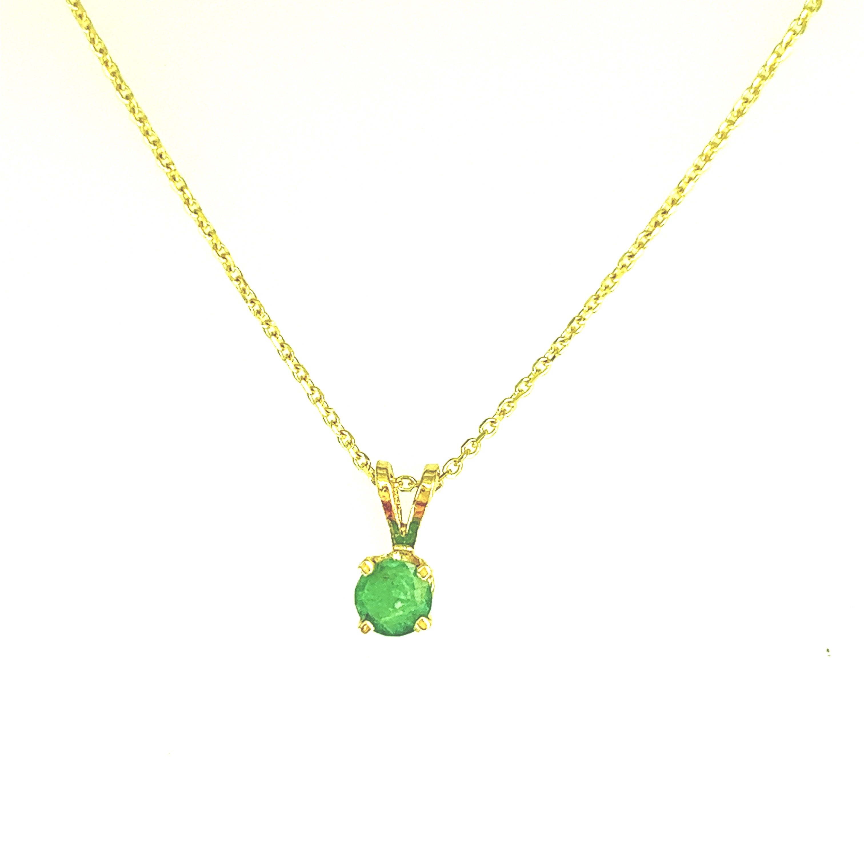 Emerald pendant in 14k yellow gold